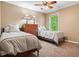 Light filled bedroom featuring two beds, a neutral color palette, and plush carpeting at , Cumming, GA 30041