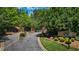 Community entrance with sign and landscaped entrance at , Cumming, GA 30041