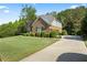 Charming two-story brick home with well maintained yard and an extra long driveway at , Cumming, GA 30041