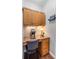 A cozy office nook with granite countertop, natural wood cabinets, and designer appointments at , Cumming, GA 30041
