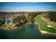 Lakeside home with pool, golf course, and dock offering breathtaking views of the neighborhood and the lake at 1160 Lake Shore Overlook, Alpharetta, GA 30005