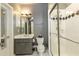Bathroom featuring a gray vanity, white quartz countertop, and glass enclosed shower at 1160 Lake Shore Overlook, Alpharetta, GA 30005