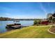 Private boat dock with a pontoon boat, offering easy access to lake activities at 1160 Lake Shore Overlook, Alpharetta, GA 30005