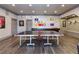 Spacious game room with ping pong table, sports memorabilia, and neutral paint color at 1160 Lake Shore Overlook, Alpharetta, GA 30005