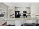 Well-equipped kitchen with granite countertops, white cabinetry, and modern appliances at 5076 Longview Walk, Decatur, GA 30035