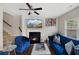 Cozy living room showcasing a fireplace, plush seating, and modern entertainment setup at 5076 Longview Walk, Decatur, GA 30035