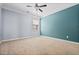 Bedroom with ceiling fan, neutral paint colors and carpet at 531 Rokeby Dr, Woodstock, GA 30188