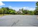 Community clubhouse with a playground, a basketball court, and meticulously maintained landscaping at 531 Rokeby Dr, Woodstock, GA 30188