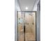 Tiled walk-in shower featuring glass door and shower head at 531 Rokeby Dr, Woodstock, GA 30188
