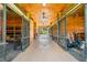 Spacious barn interior with ample natural light, stall doors and a glimpse of the outdoor scenery at 96 Landers Ne Rd, Rydal, GA 30171