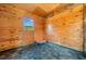Well-lit barn interior featuring wooden walls, a window, and a functional space at 96 Landers Ne Rd, Rydal, GA 30171