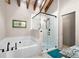 Bright bathroom with a soaking tub, glass-enclosed shower, and modern fixtures at 96 Landers Ne Rd, Rydal, GA 30171