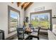 Charming dining area with large windows offering scenic views of the surrounding landscape at 96 Landers Ne Rd, Rydal, GA 30171