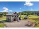 Striking barn home featuring a full guest house and an abundance of land in a picturesque setting at 96 Landers Ne Rd, Rydal, GA 30171