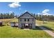 Beautiful barn home with spacious yard, RV parking, and easy access to a maintained gravel driveway at 96 Landers Ne Rd, Rydal, GA 30171