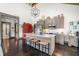 Charming kitchen featuring hardwood floors, granite countertops and stainless-steel appliances at 96 Landers Ne Rd, Rydal, GA 30171