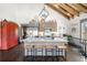 Open-concept kitchen with granite countertops, stainless steel appliances, hardwood floors, and vaulted ceilings at 96 Landers Ne Rd, Rydal, GA 30171