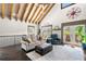 Inviting living room with vaulted ceilings, hardwood floors, a modern ceiling fan and plenty of natural light at 96 Landers Ne Rd, Rydal, GA 30171