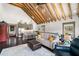 Open-concept living space with modern kitchen, comfortable seating, and wood floors at 96 Landers Ne Rd, Rydal, GA 30171