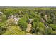 Lush green neighborhood with mature trees, manicured lawns and winding roads, creating a serene and private setting at 289 W Paces Ferry Nw Rd, Atlanta, GA 30305