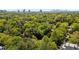 Lush green neighborhood with mature trees, manicured lawns and winding roads, showcasing the beauty of Atlanta at 289 W Paces Ferry Nw Rd, Atlanta, GA 30305
