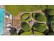 Overhead shot of a meticulously designed backyard garden featuring manicured hedges, stone pathways, and seating areas at 289 W Paces Ferry Nw Rd, Atlanta, GA 30305