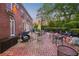 Charming brick patio with elegant outdoor seating, perfect for entertaining and relaxing at 289 W Paces Ferry Nw Rd, Atlanta, GA 30305