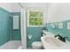 Bathroom with a bathtub and shower combination and classic tile surround at 3007 Octavia Cir, Marietta, GA 30062