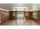 Large garage space with brick accents, great light, and potential for customization at 3007 Octavia Cir, Marietta, GA 30062
