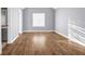Bedroom with hardwood flooring, natural light, and neutral paint, creating a warm, inviting space at 939 Redan Trce, Stone Mountain, GA 30088