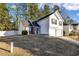 A charming two-story home with a two-car garage and a well-manicured lawn in a residential neighborhood at 939 Redan Trce, Stone Mountain, GA 30088