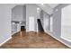 Spacious living room with hardwood floors, vaulted ceiling, fireplace, and lots of natural light at 939 Redan Trce, Stone Mountain, GA 30088