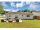 Spacious backyard with patio featuring an outdoor seating area at 1626 Cobbs Creek Ln, Decatur, GA 30032