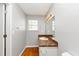 Modern bathroom featuring a vanity, large mirror, natural light, and a clean aesthetic at 1626 Cobbs Creek Ln, Decatur, GA 30032