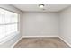 Bedroom with window that lets in natural light at 1626 Cobbs Creek Ln, Decatur, GA 30032