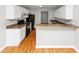 Spacious kitchen with white cabinets, brown countertops, and stainless steel appliances at 1626 Cobbs Creek Ln, Decatur, GA 30032