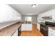 Open kitchen layout with ample cabinet space and modern appliances at 1626 Cobbs Creek Ln, Decatur, GA 30032