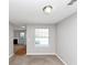 Living room with lots of light, neutral paint and carpet at 1626 Cobbs Creek Ln, Decatur, GA 30032
