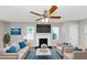 Comfortable living room with decor accents, fireplace and a large television at 1626 Cobbs Creek Ln, Decatur, GA 30032