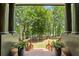Stairway provides backyard access with lovely landscaping and lake views at 4290 Bobbins Way, Cumming, GA 30041