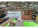 Spacious boathouse with storage and lighting providing a convenient space for watercraft at 4290 Bobbins Way, Cumming, GA 30041