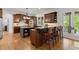 Spacious kitchen with granite counters, kitchen island and a breakfast bar with counter seating for casual dining at 4290 Bobbins Way, Cumming, GA 30041