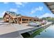 Lakeside restaurant with a tiki bar, boat docks, and waterfront views; perfect for enjoying a meal with a view at 4290 Bobbins Way, Cumming, GA 30041