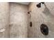 Shower with tile surround, multiple shower heads, and bronze fixtures at 4290 Bobbins Way, Cumming, GA 30041