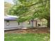 Beautiful home with a sprawling yard and a deck, perfect for outdoor entertaining and relaxation at 7580 Blacks Mill Rd, Cumming, GA 30028