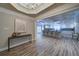 Inviting foyer with view to kitchen, showcasing the home's open layout and modern design at 7580 Blacks Mill Rd, Cumming, GA 30028