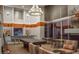 Inviting common room with a pool table, comfortable seating, and large windows at 860 Peachtree Ne St # 2815, Atlanta, GA 30308