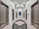 Hallway with stainless steel elevators and granite-look flooring in a shared building space at 860 Peachtree Ne St # 2815, Atlanta, GA 30308