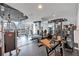 Large gym featuring weight machines, free weights, and mirrored walls at 860 Peachtree Ne St # 2815, Atlanta, GA 30308