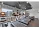 Well-equipped gym featuring modern treadmills, exercise bikes, and cityscape views at 860 Peachtree Ne St # 2815, Atlanta, GA 30308